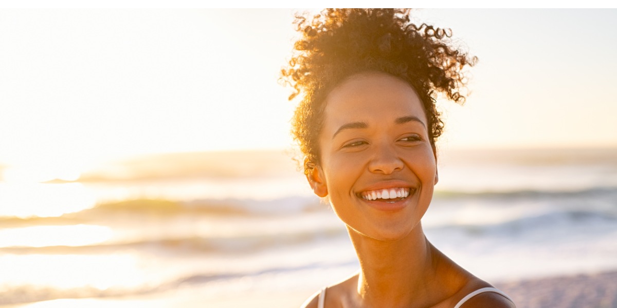 happy woman smiling representing relief from depression