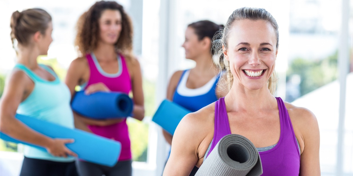 women in exercise class helps prevent depression