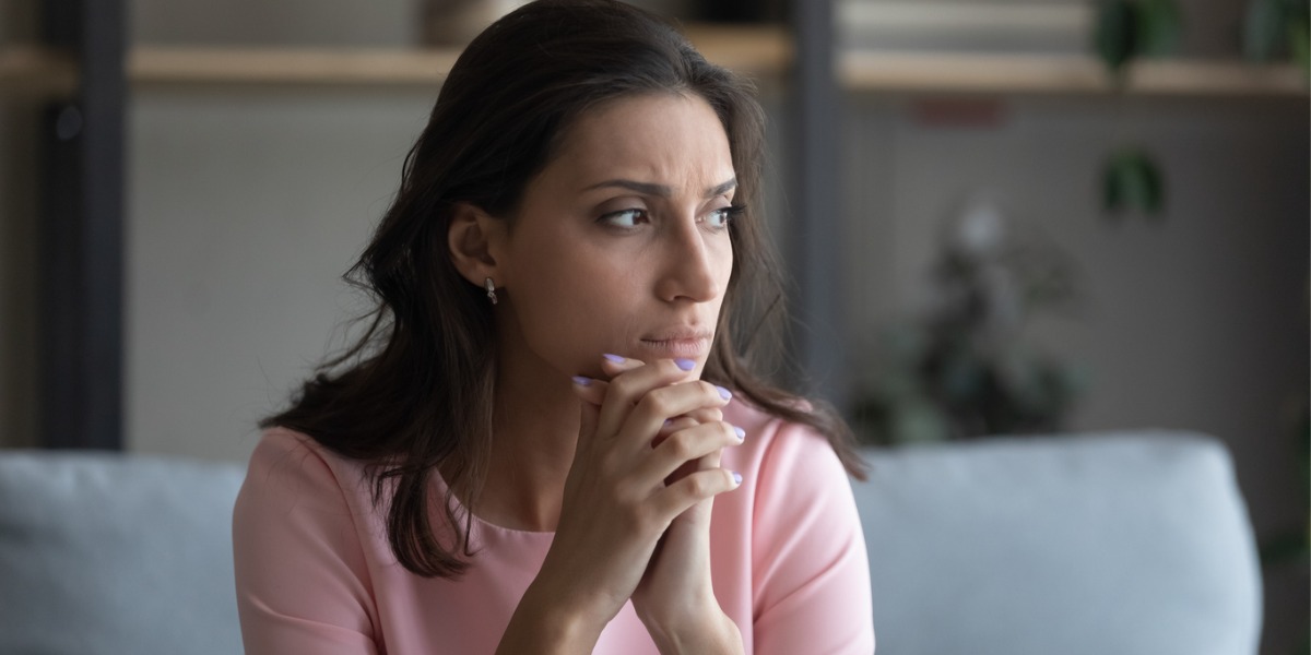 woman sitting and thinking