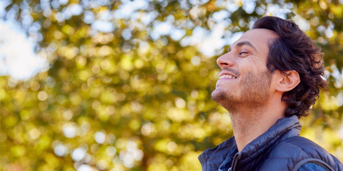 man smiling outside after depression lifts