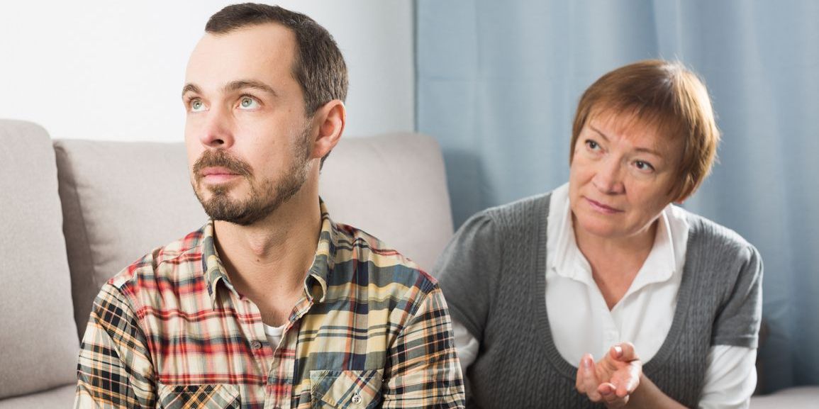 mother talking to son with delusions about treatment